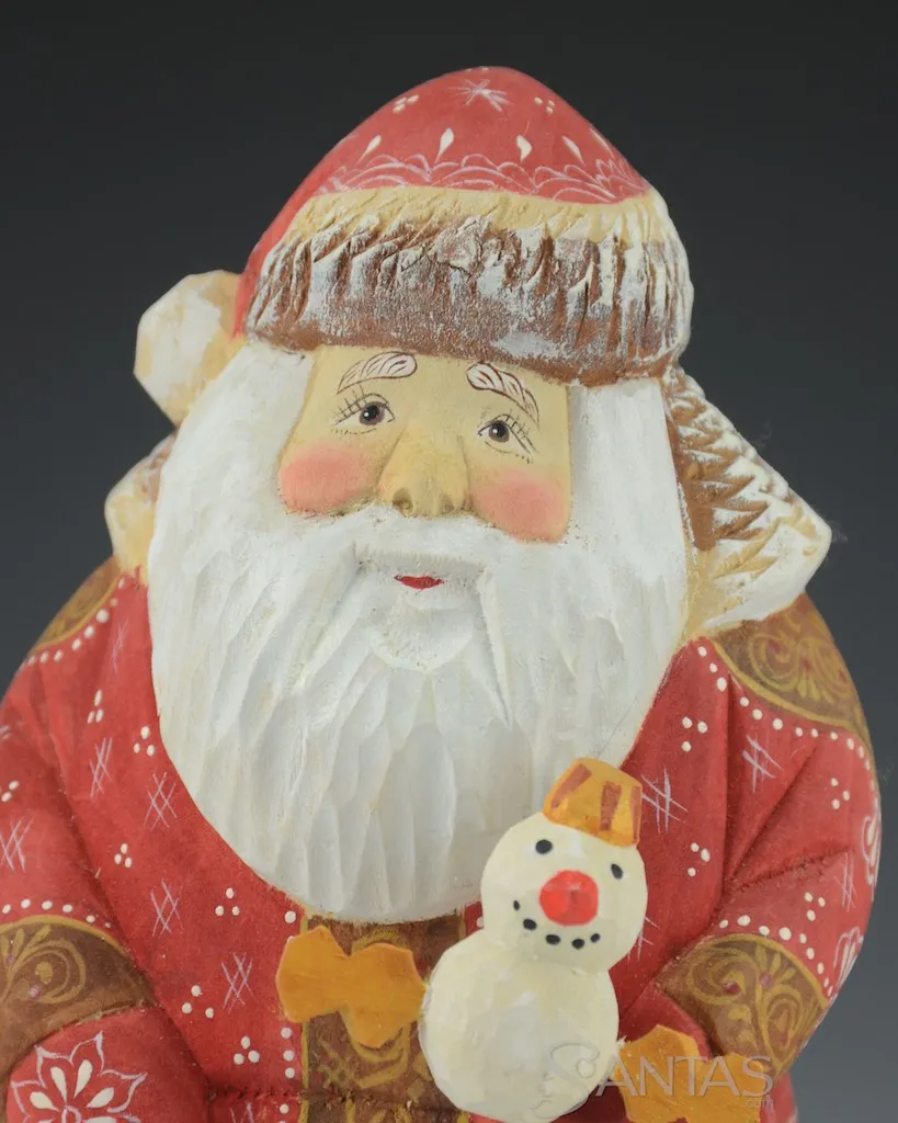 Wooden Russian Santa Claus Holding a Little Snowman and Toy Bag